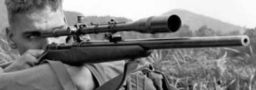 Photo Courtesy of American Shooting Journal-- Carlos Hathcock with his Winchester M70 and 8X Unertl Optic